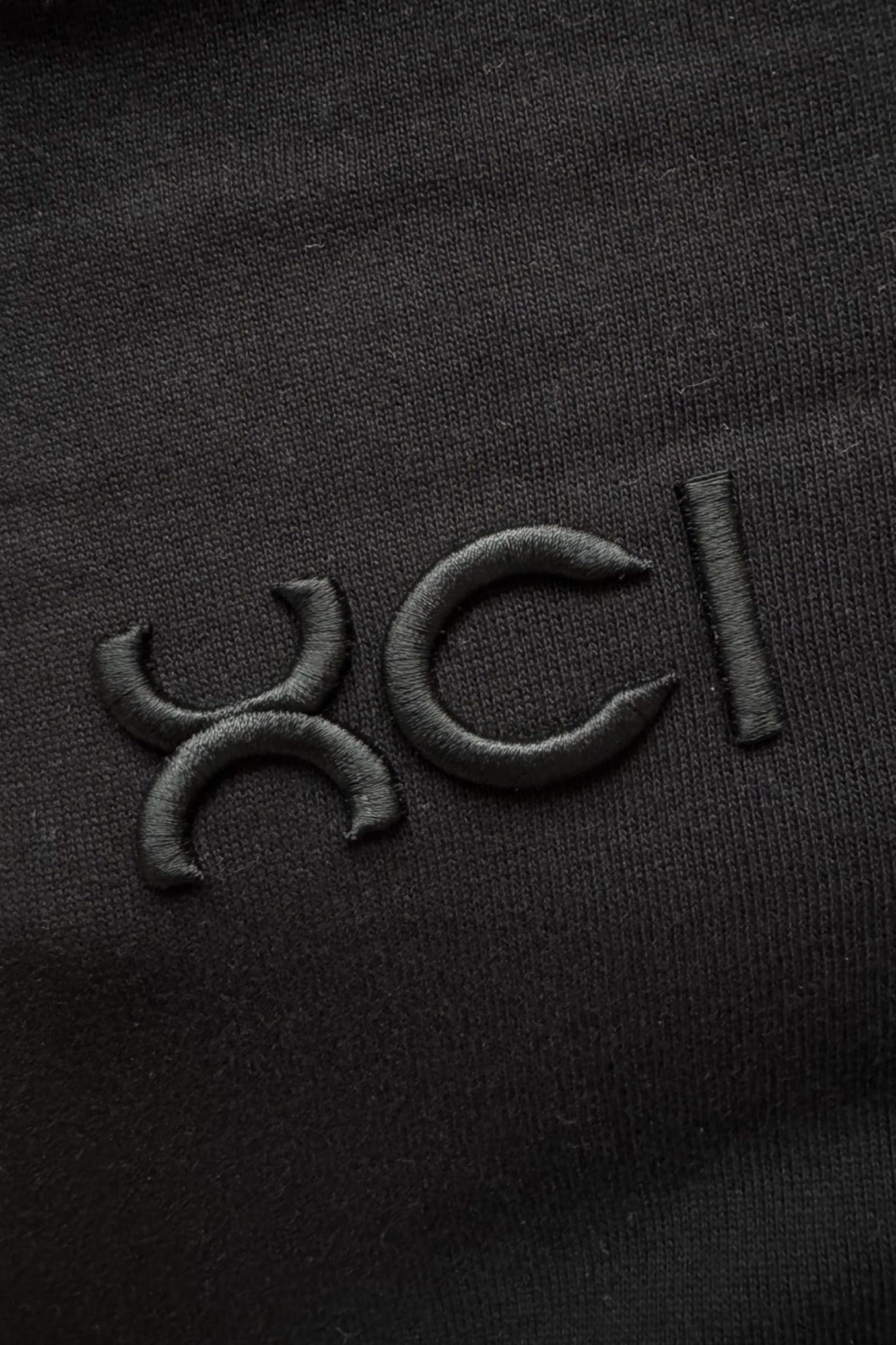 XCI LOGO OVERSIZE T-SHIRT / BLACK